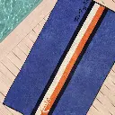 toalla-playa-terciopelo-65440-portals-90x165-secaneta-2.webp
