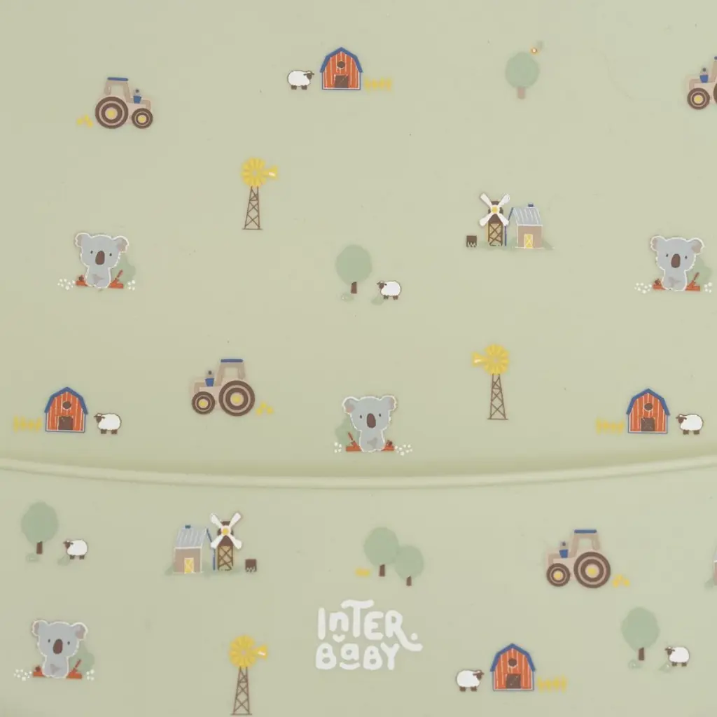 babero-silicona-estampado-modelo-granja-koala-verde-interbaby-2.webp
