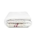 funda-nordica-reversible-desefundable-con-relleno-chichonera-mod.-flores-petalos-rosa-interbaby-4.webp